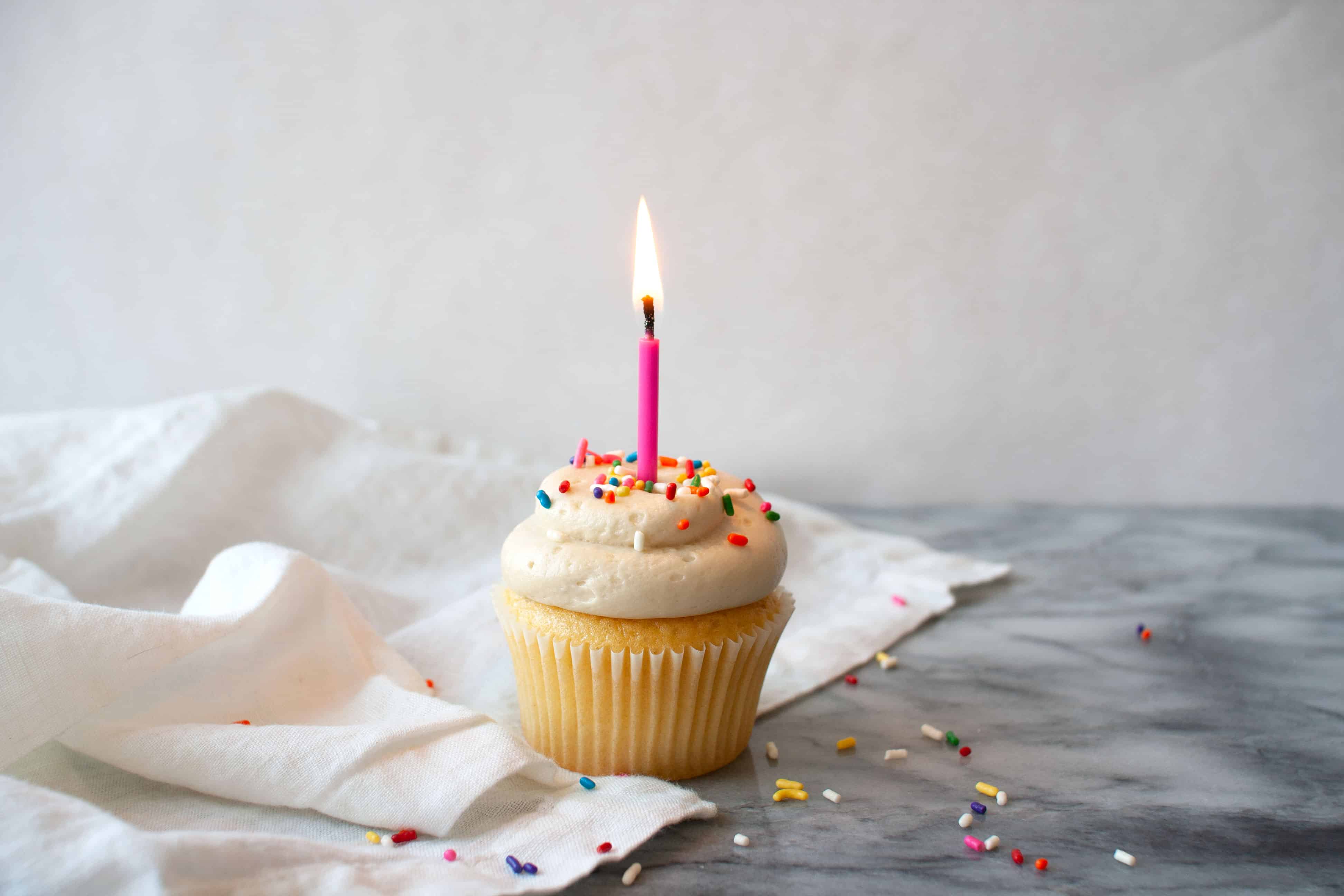 Cupcake with lighted candle.